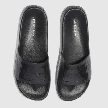CALVIN KLEIN BLACK JEANS CHRISTIE JELLY SANDALS CALVIN KLEIN BLACK JEANS CHRISTIE JELLY SANDALS