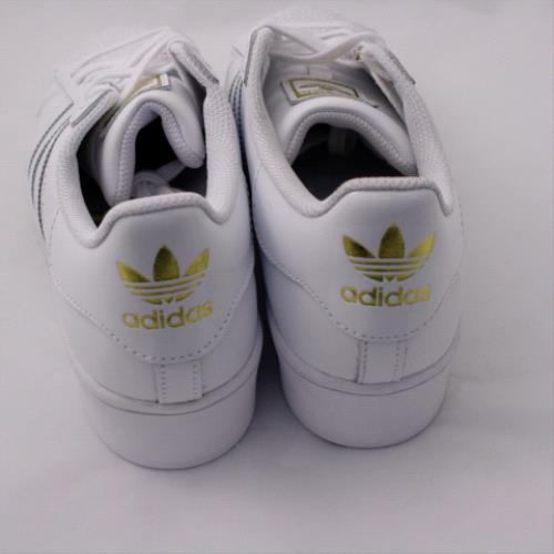 adidas white & gold superstar trainers