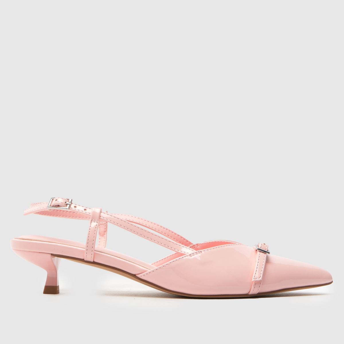 Click to view product details and reviews for Schuh Sybill Buckle Kitten Low Heels In Pale Pink.