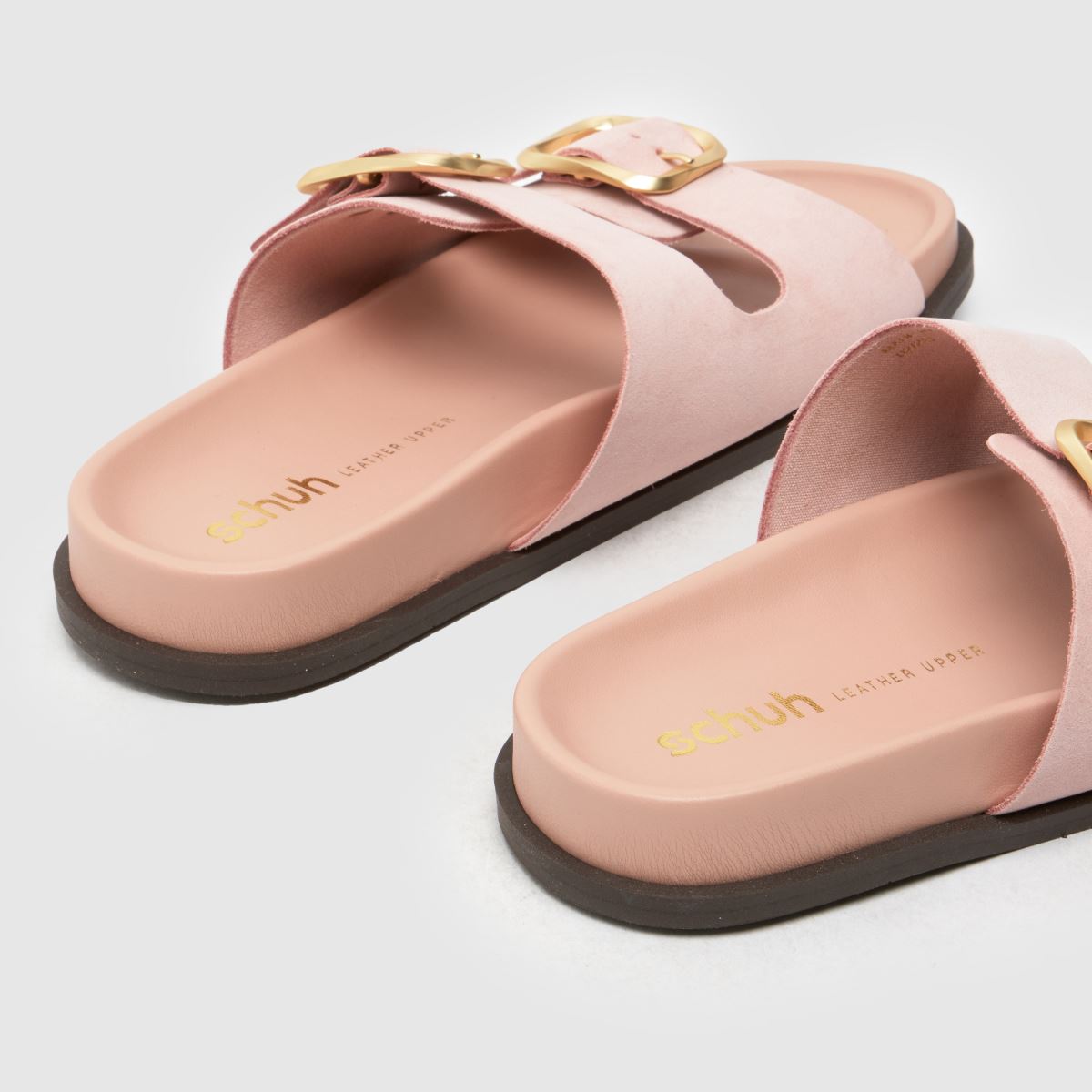 schuh Tylee Buckle Footbed Sandals in Pale Pink schuh Tylee Buckle Footbed Sandals in Pale Pink
