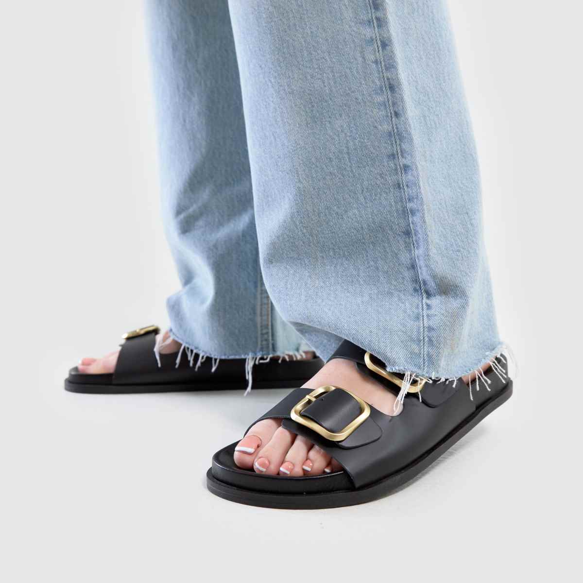 schuh Tylee Leather Buckle Footbed in Black