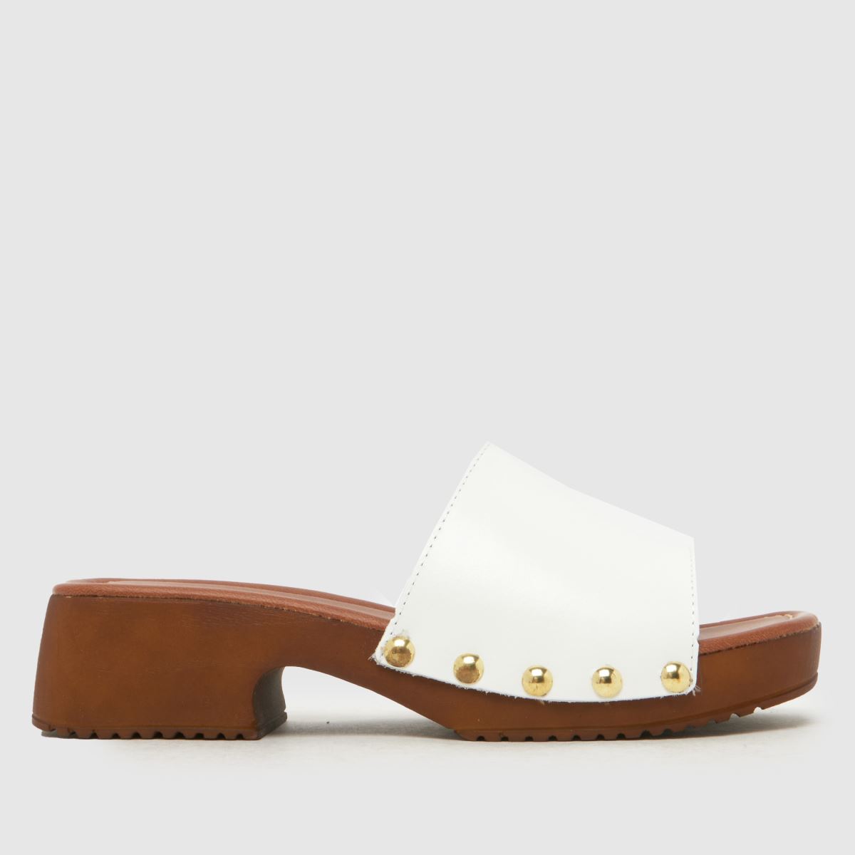 Click to view product details and reviews for Schuh Verity Leather Clog Sandals In White.