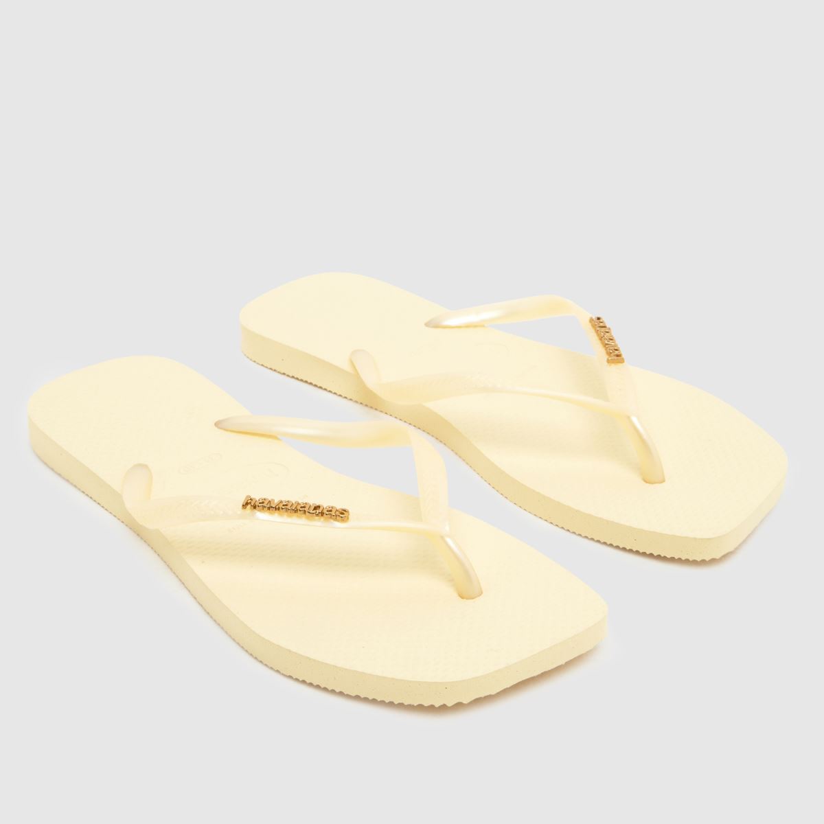 Havaianas Slim Square Logo Metallic Sandals in Pale Yellow