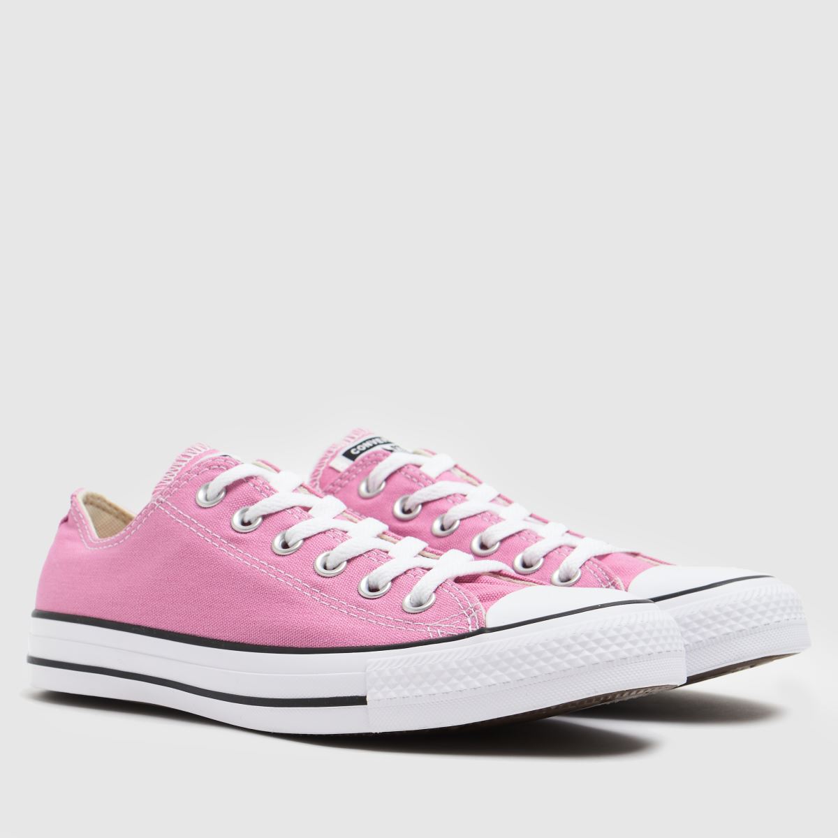 pink converse with stars