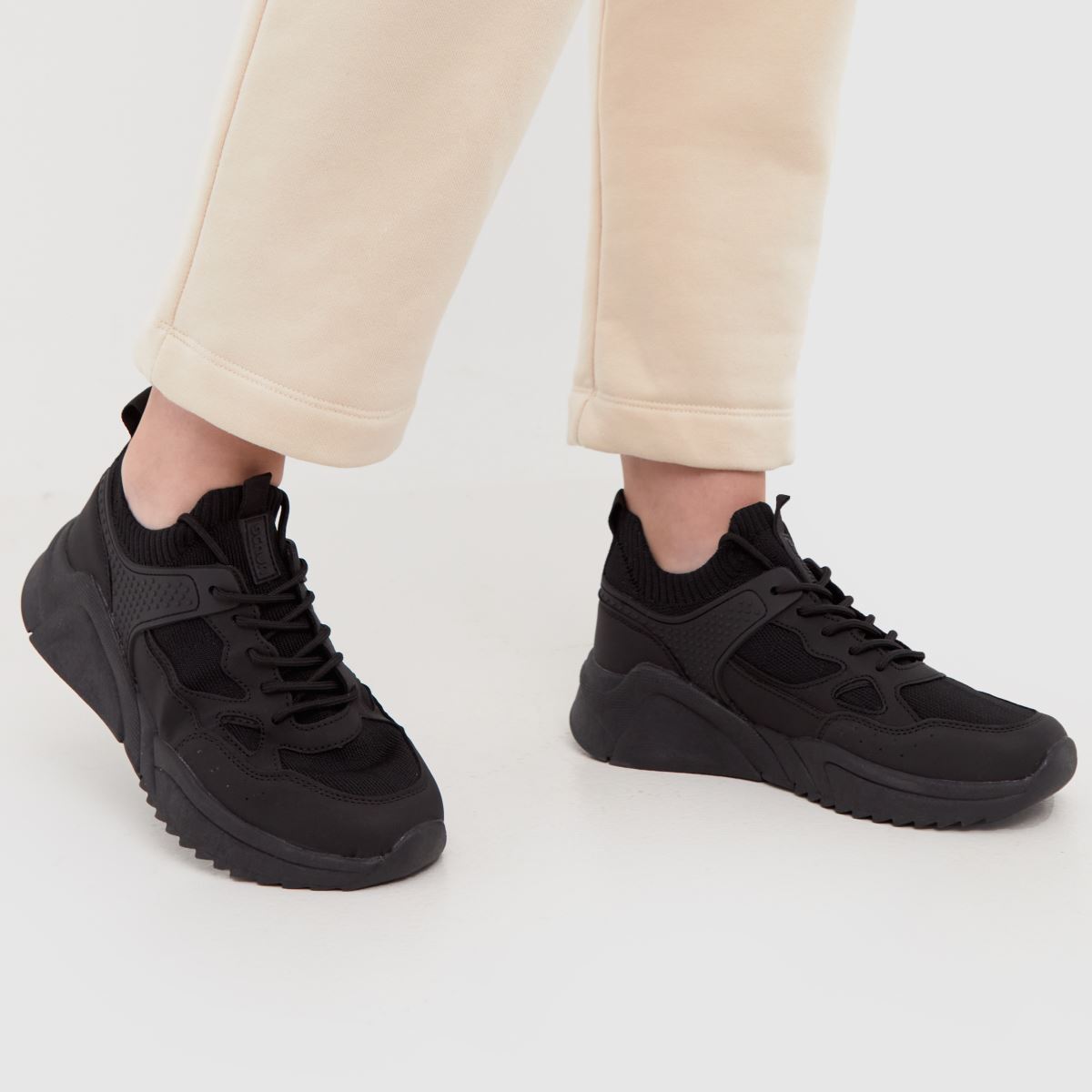 Schuh black trainers Clearance