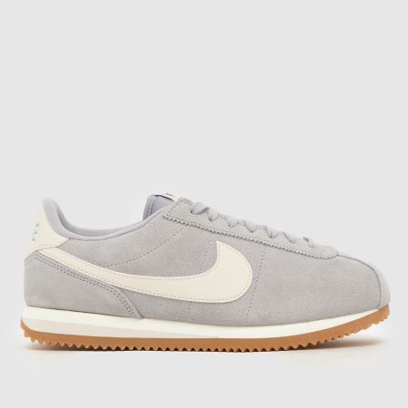 grey and white nike cortez