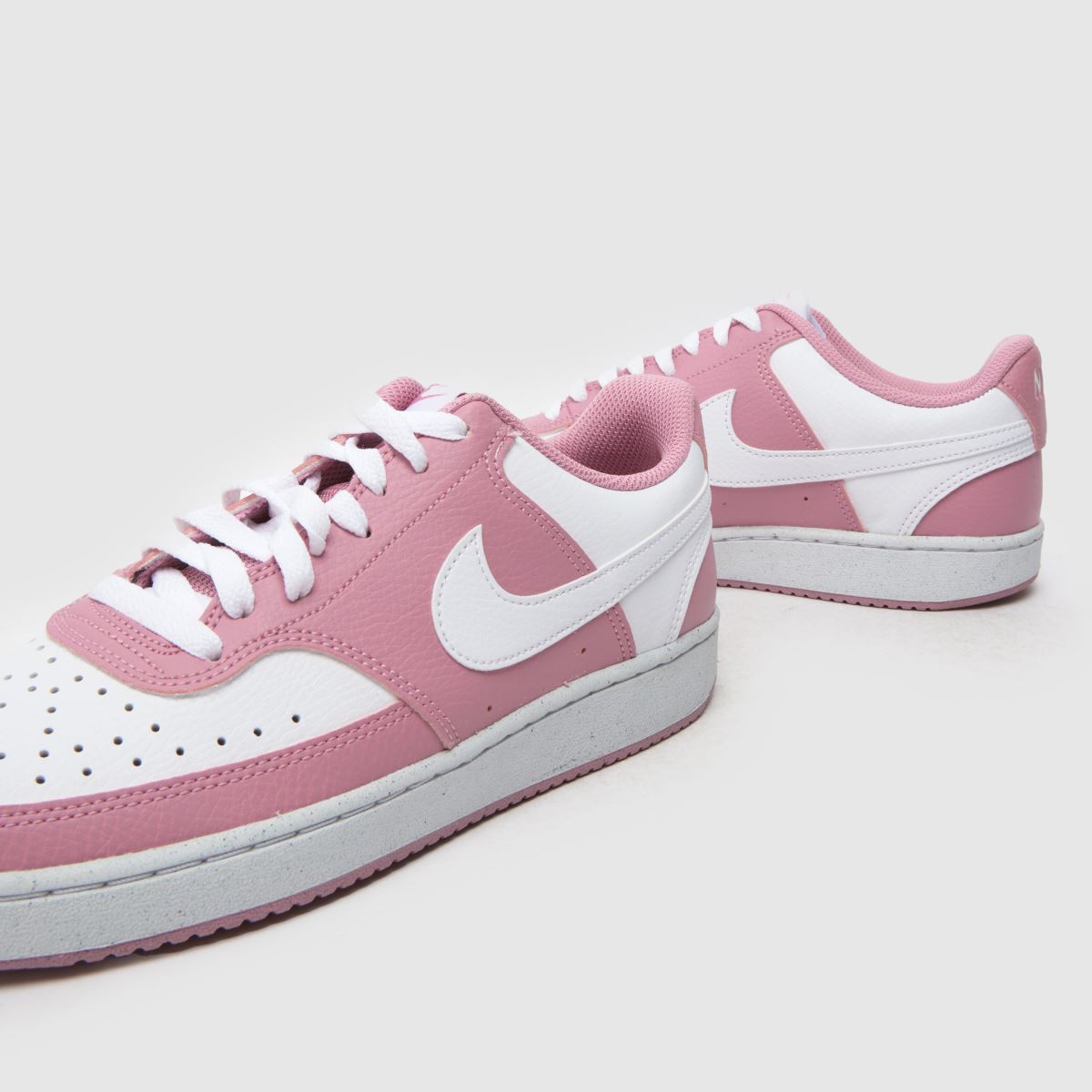 nike white and pink court vision trainers