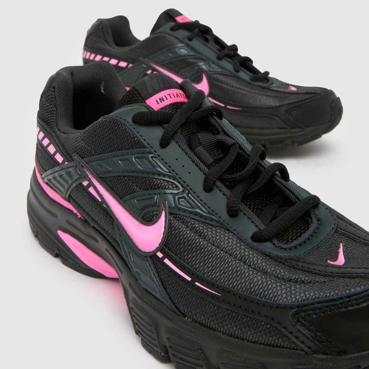 black with pink nike shoes
