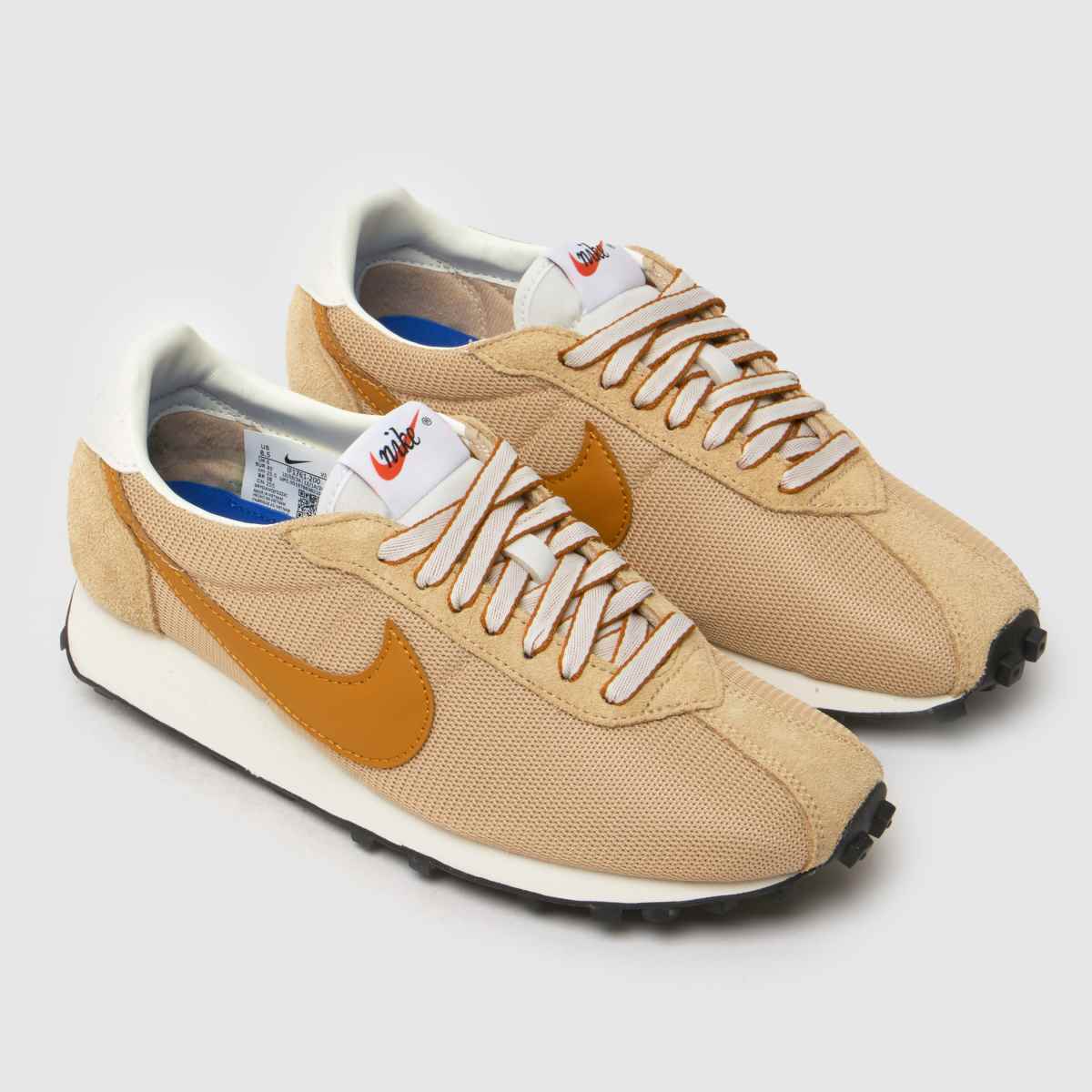 tan coloured nike trainers
