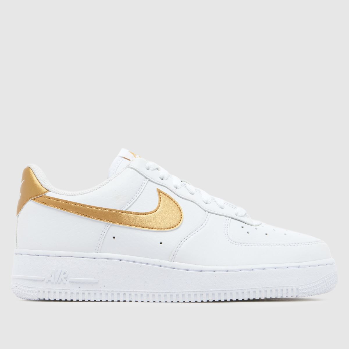 nike sneakers with gold