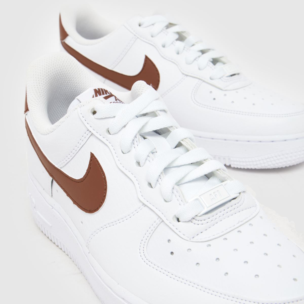 white nike brown sole