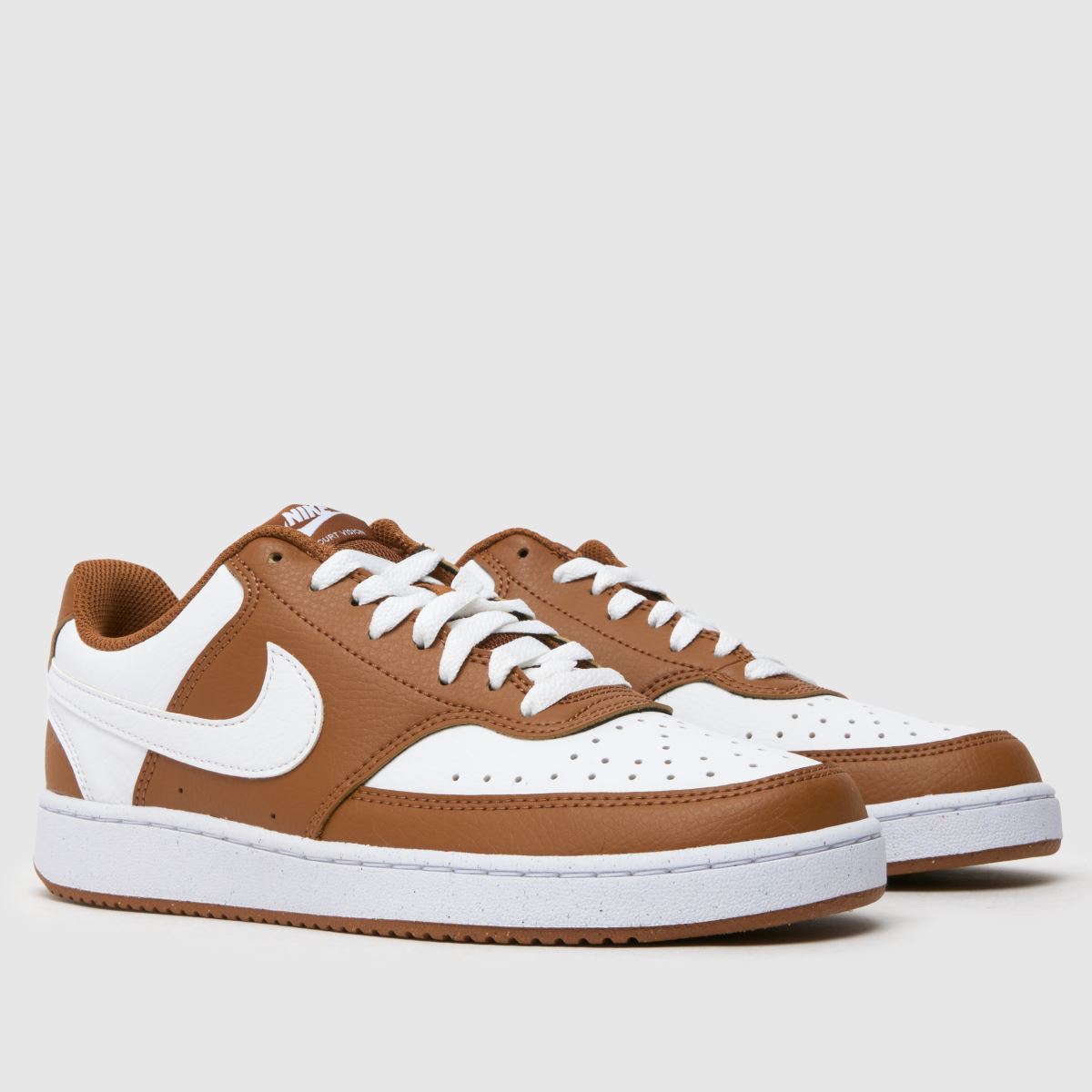 brown and white nike air force 1