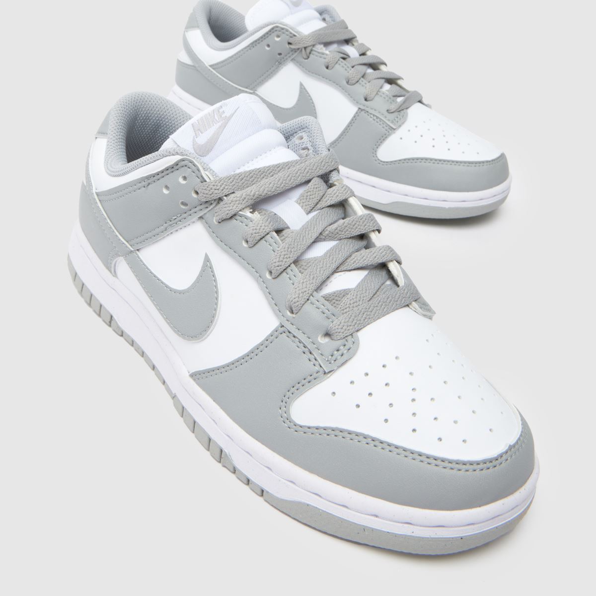 grey and white nikes