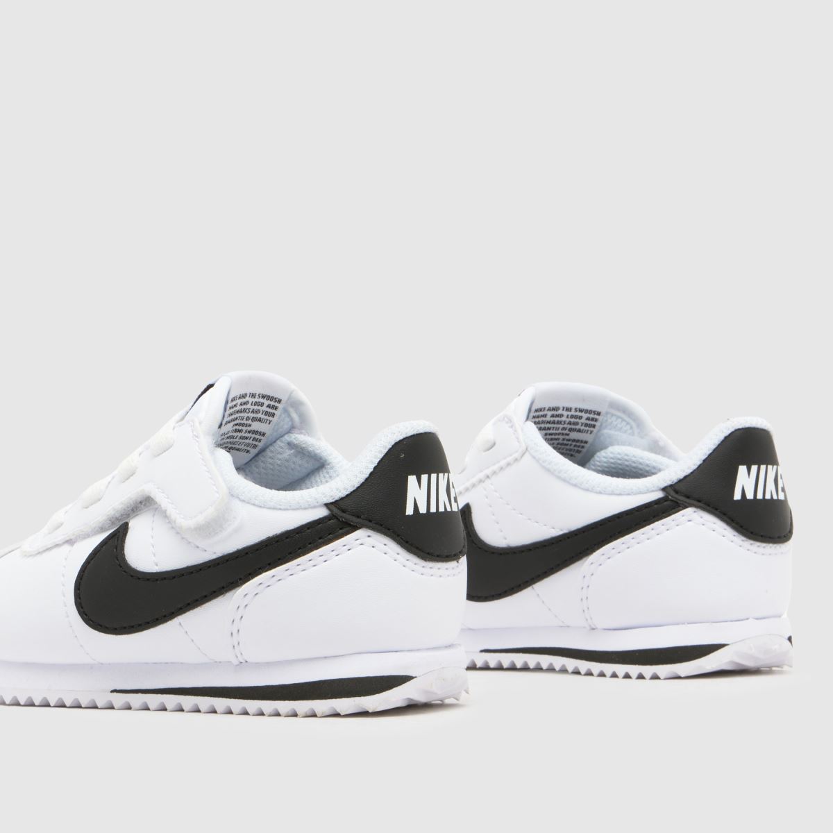 nike cortez white black swoosh