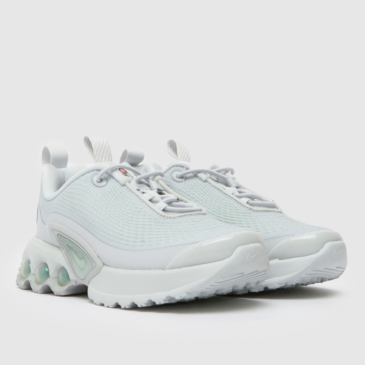 grey and green nike trainers