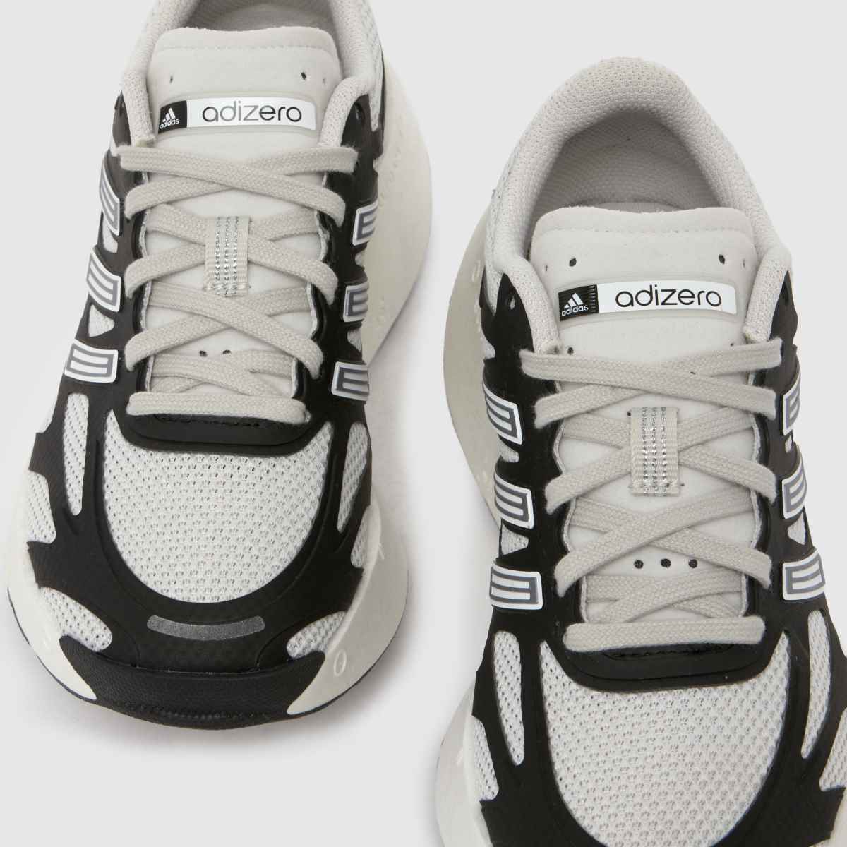 adidas Adizero Aruku Youth in Black & White adidas Adizero Aruku 4