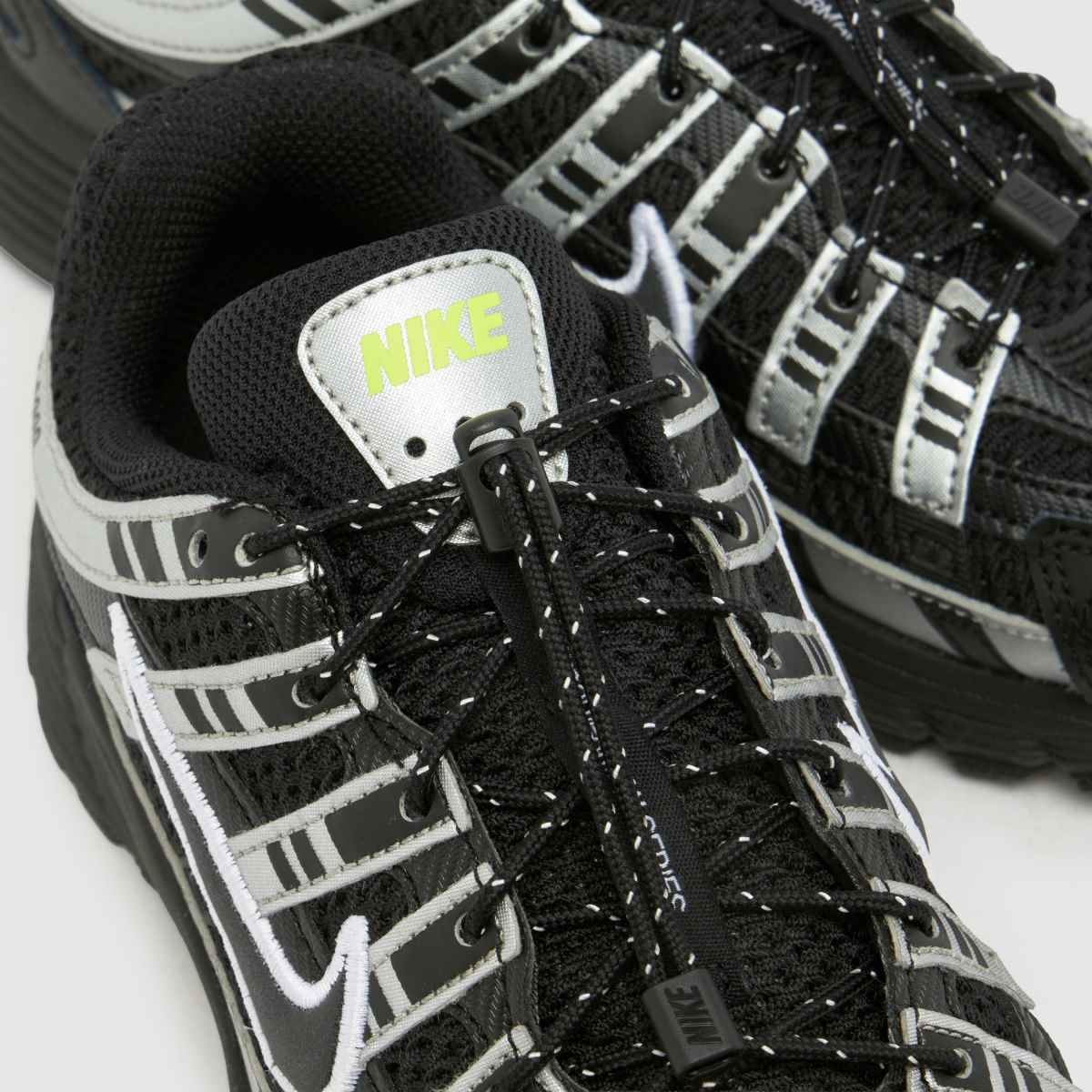 Nike P-6000 Youth in Black & Silver Nike P-6000 7