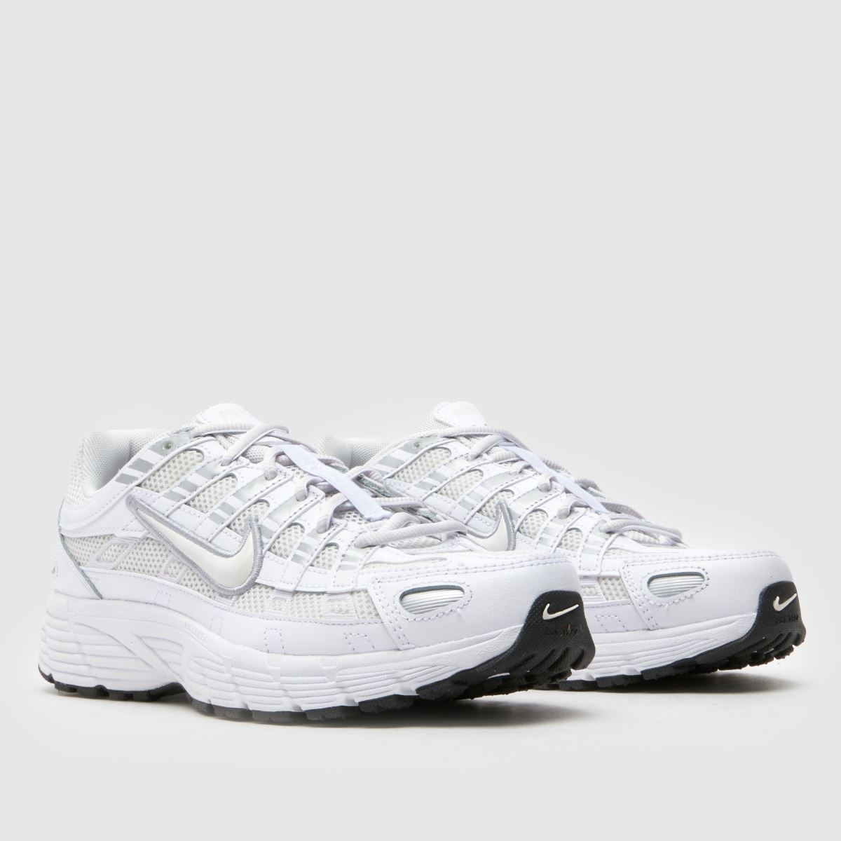 white junior nike trainers