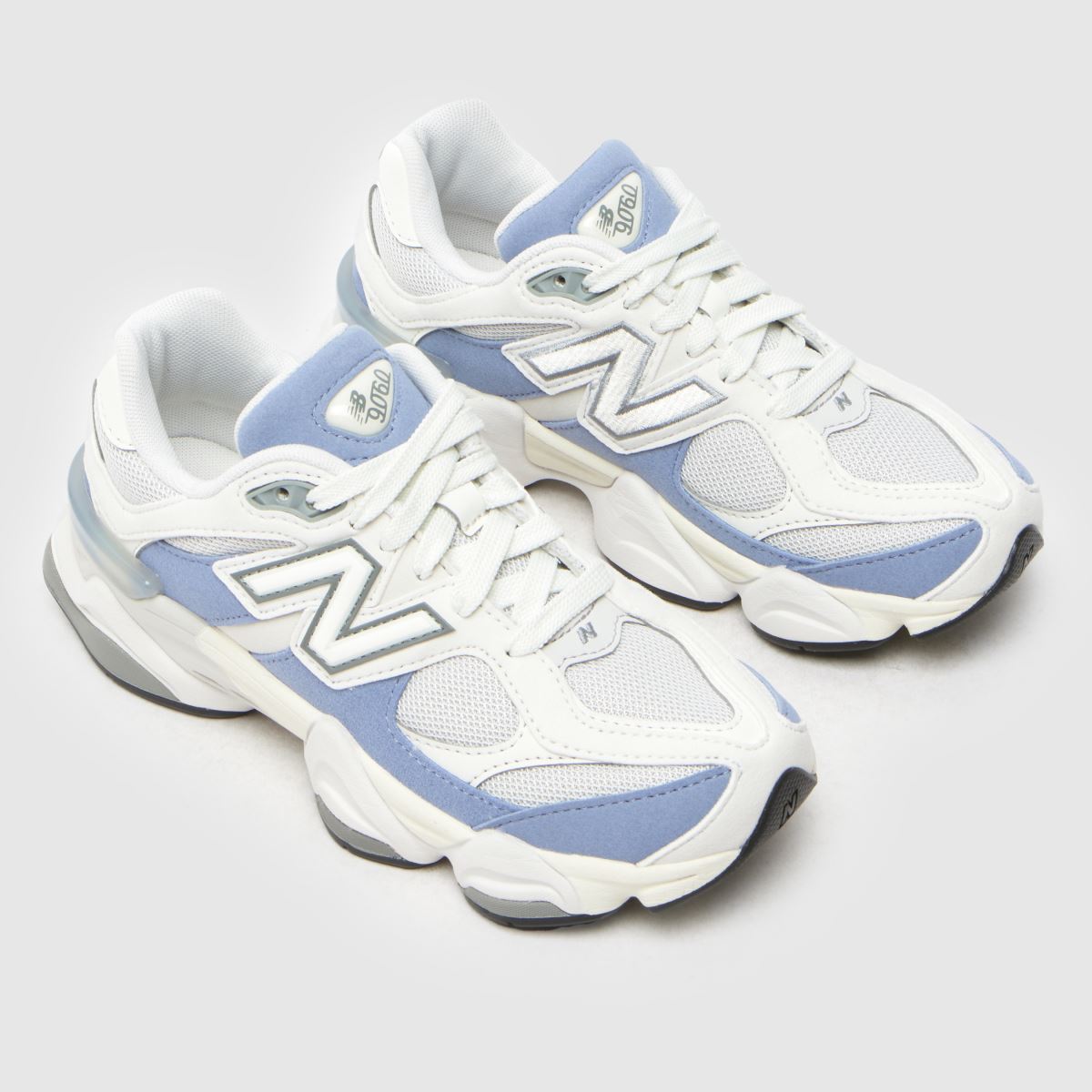 Click to view product details and reviews for New Balance White Blue 9060 Youth Trainers. Click to view product details and reviews for New Balance White Blue 9060 Youth Trainers.