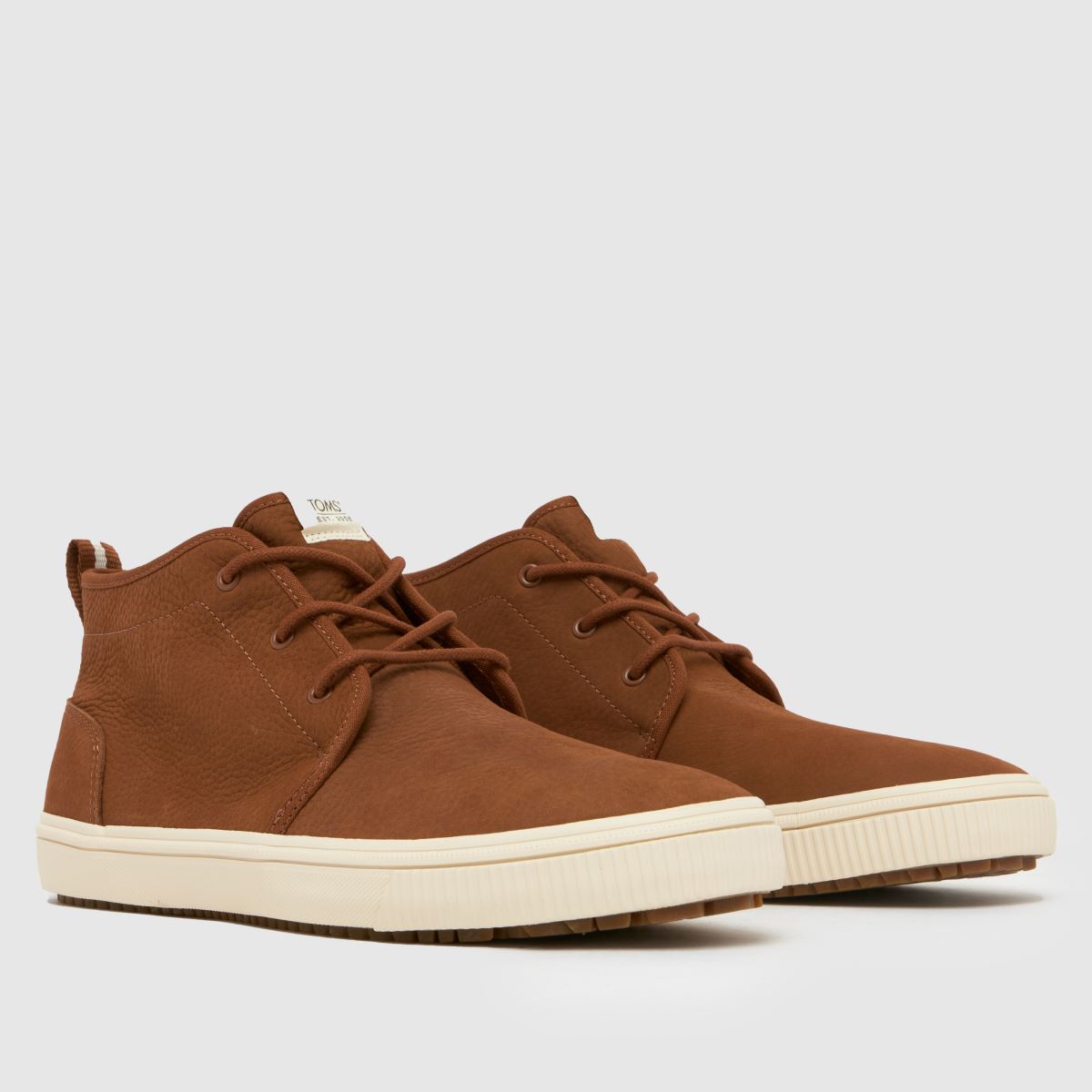 high top toms shoes environmental impact