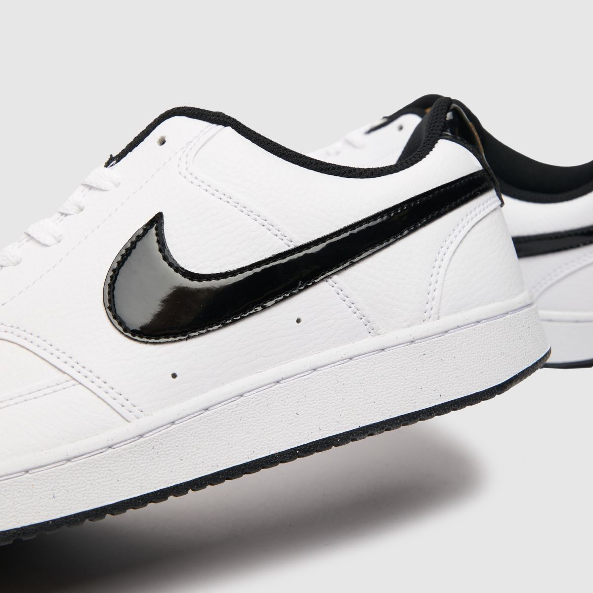 nikewhite & black court vision low trainers