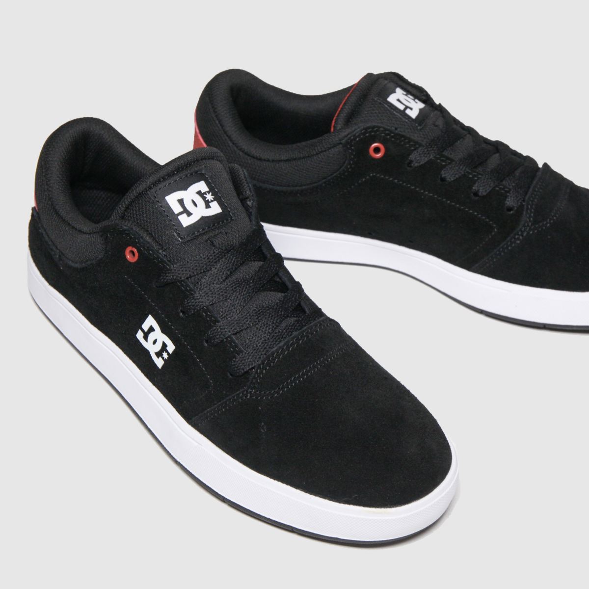 white and red dc shoes