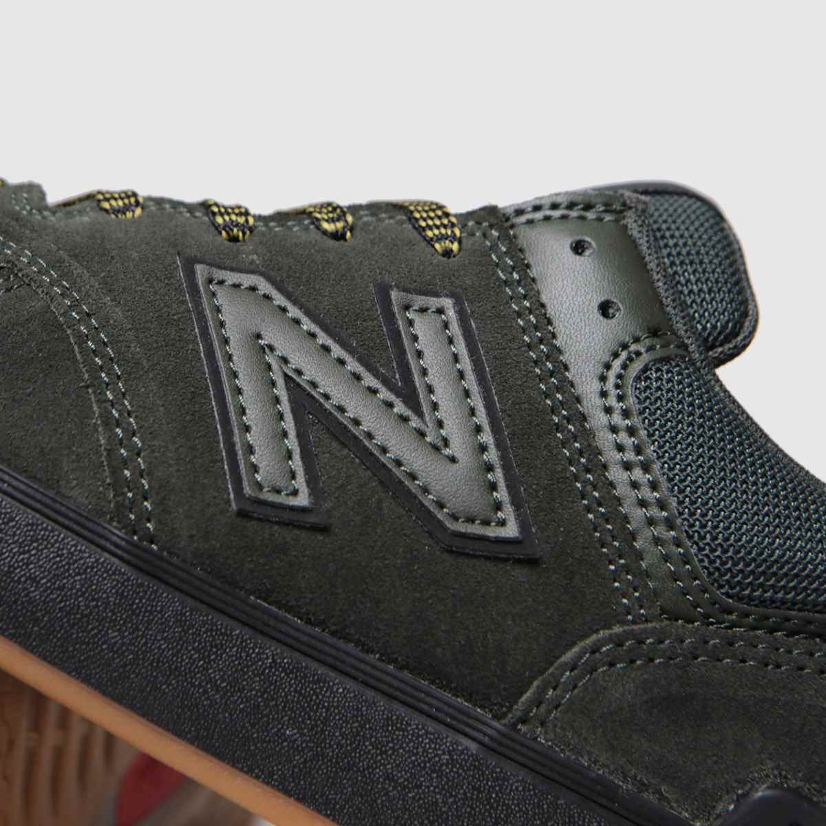 dark green 574 trainers