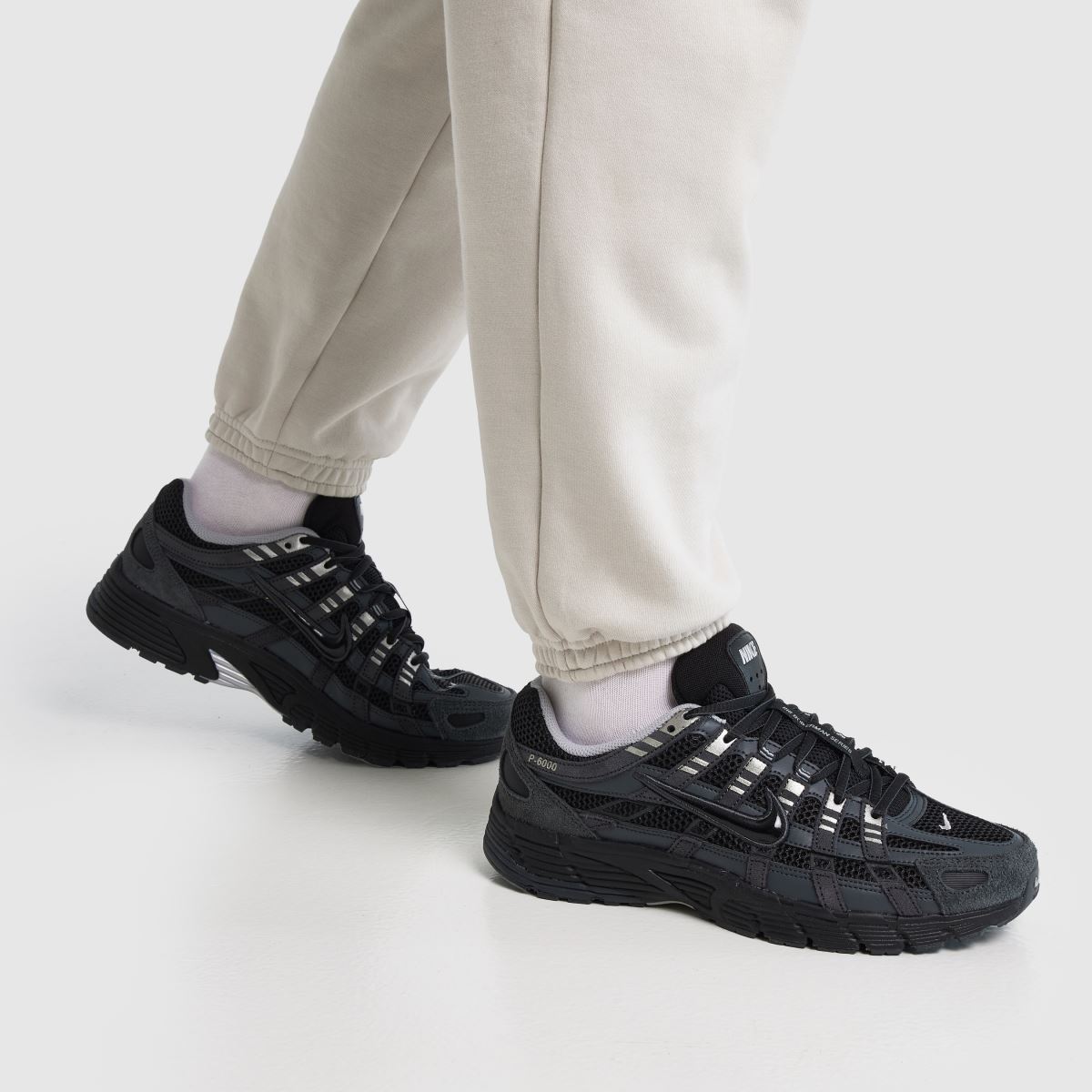 nike p 6000 black on feet