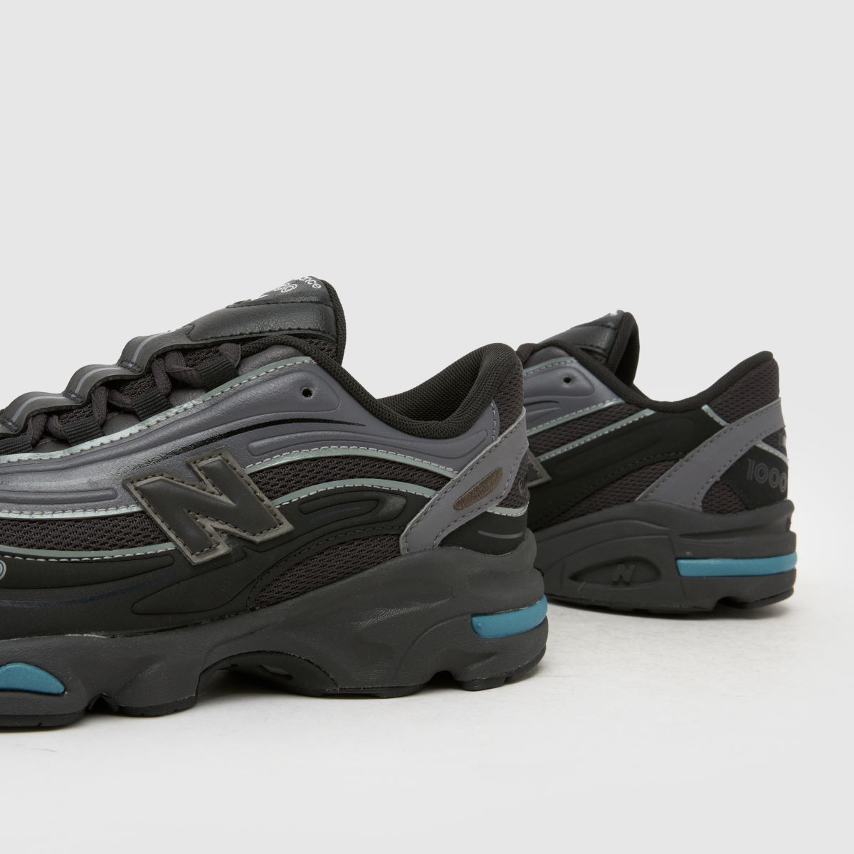New Balance 1000 Boys Youth in Black & Grey New Balance 1000 7