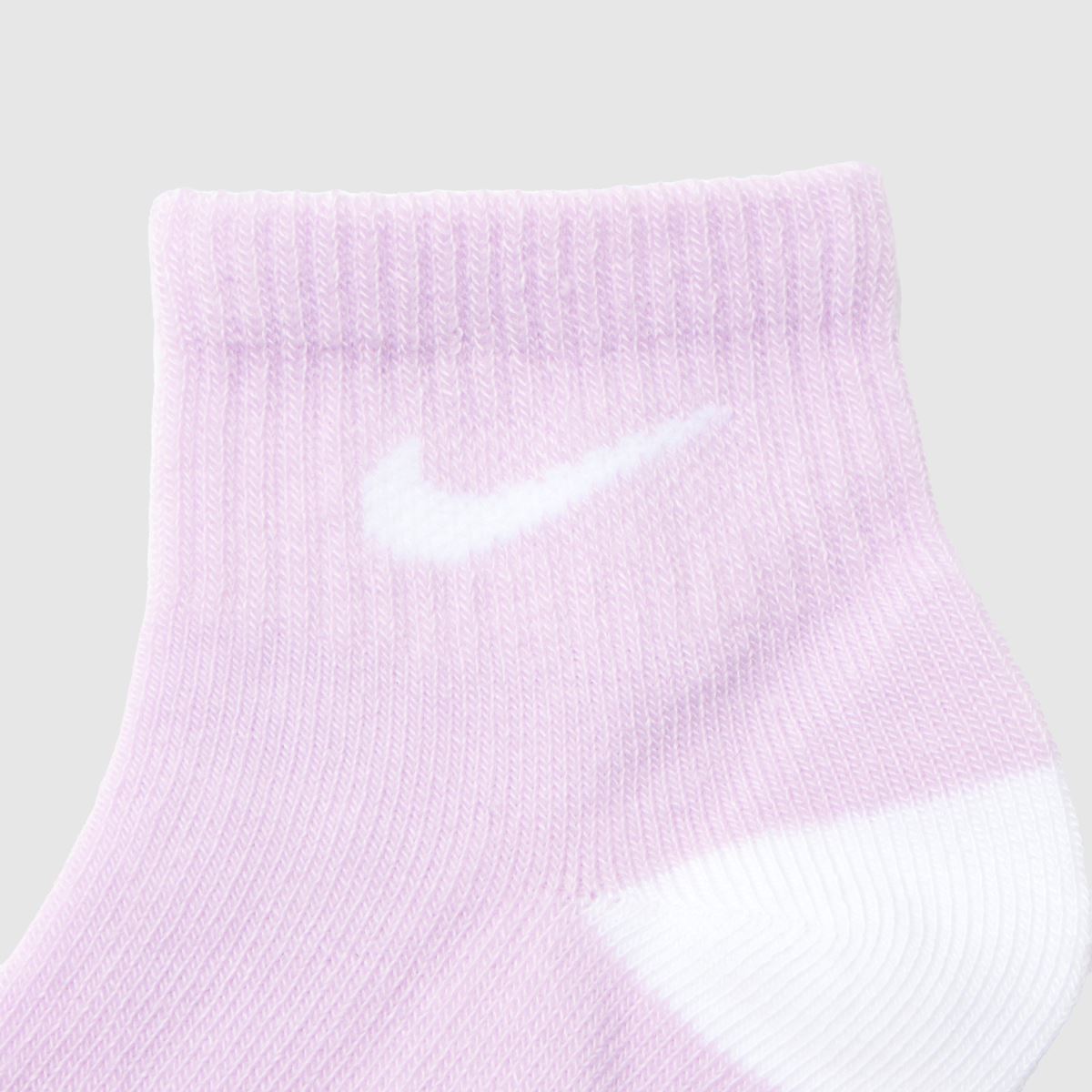 white and purple nike socks