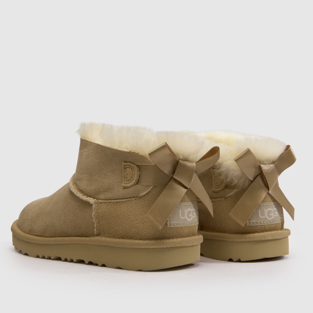 UGG Ultra Mini Bailey Bow Girls Junior in Sand UGG Ultra Mini Bailey Bow 7