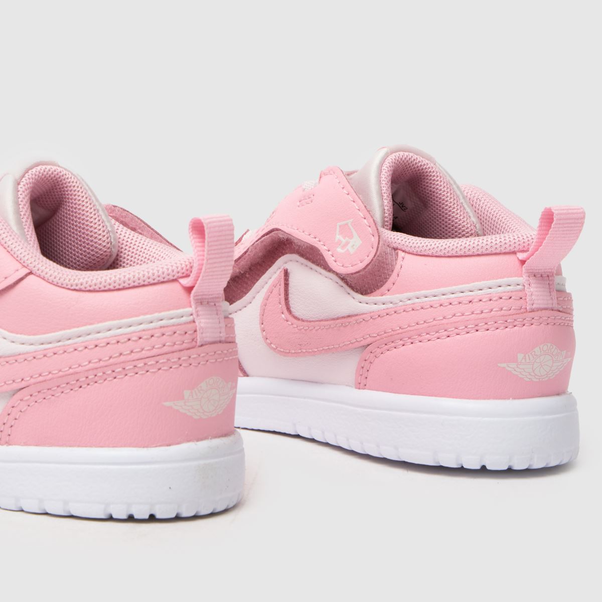 pink and white jordans 1s