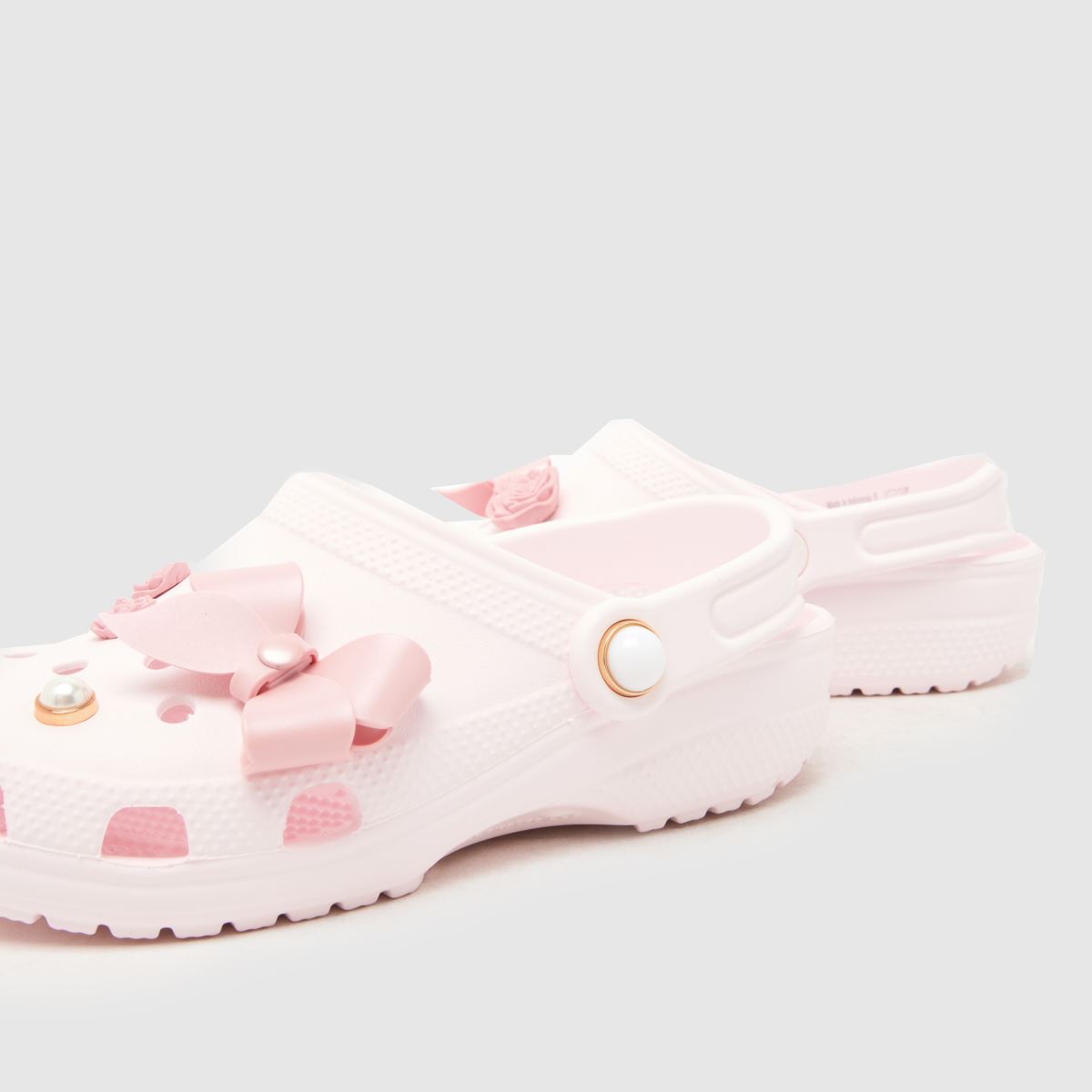 Crocs Classic Shimmer Bow Clog Girls Youth in Pink Multi Crocs Classic Shimmer Bow Clog 7