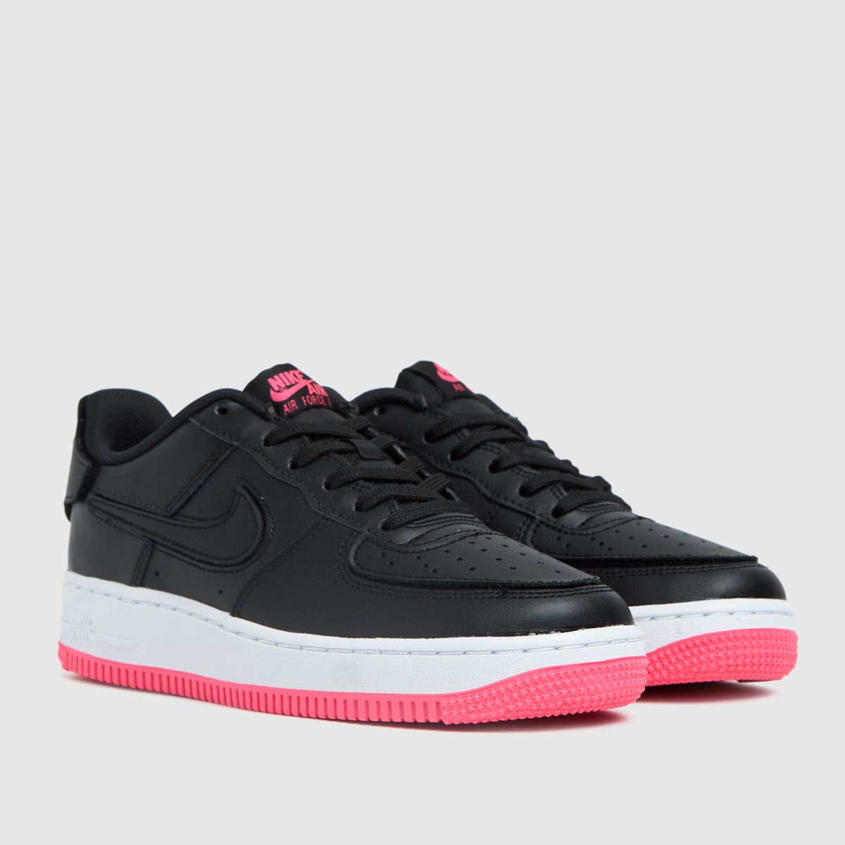 black and pink nike air trainers
