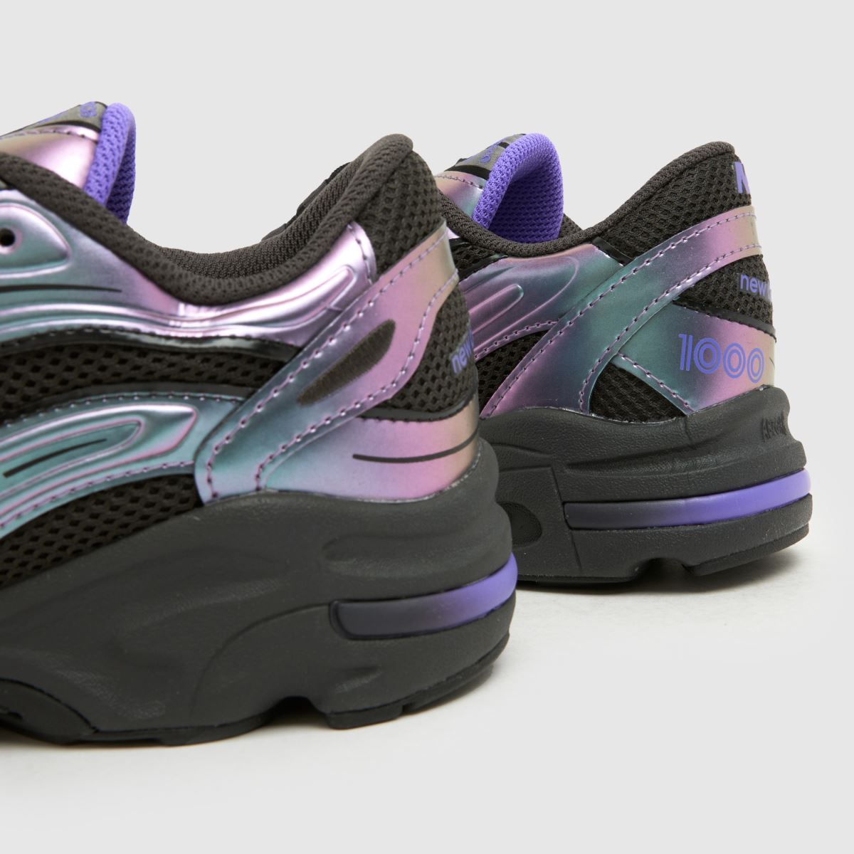 New Balance 1000 Girls Youth in Black & Purple New Balance 1000 7